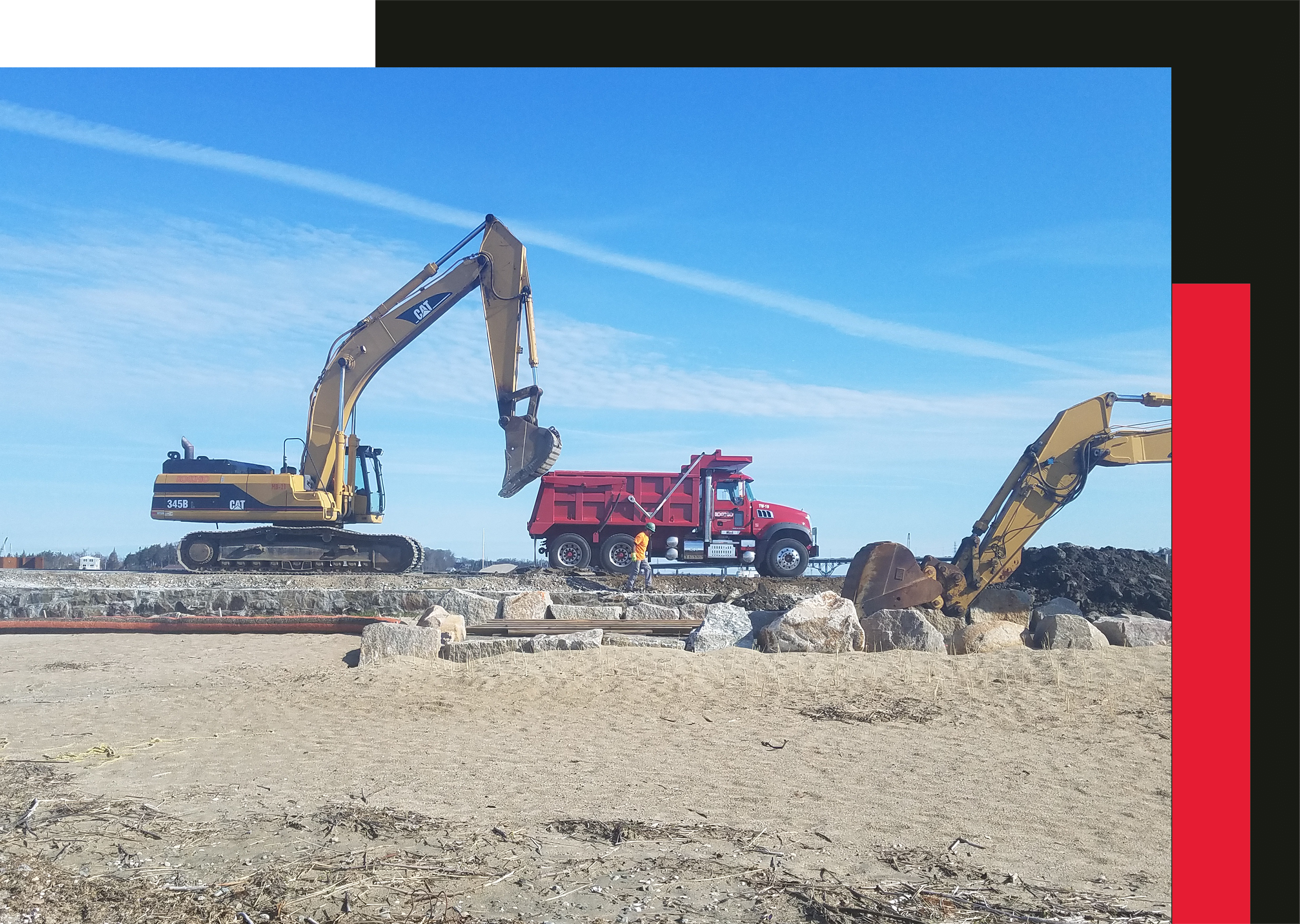 Construction vehicles, including a bulldozer and excavator, working on-site.